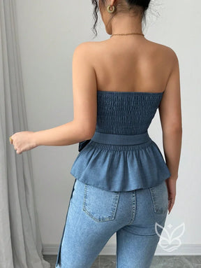 Blusa Peplum Minimalista Com Manga Bufante E Caimento Solto Blusa Peplum Minimalista Com Manga Bufante E Caimento Solto