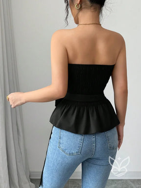 Blusa Peplum Minimalista Com Manga Bufante E Caimento Solto Blusa Peplum Minimalista Com Manga Bufante E Caimento Solto