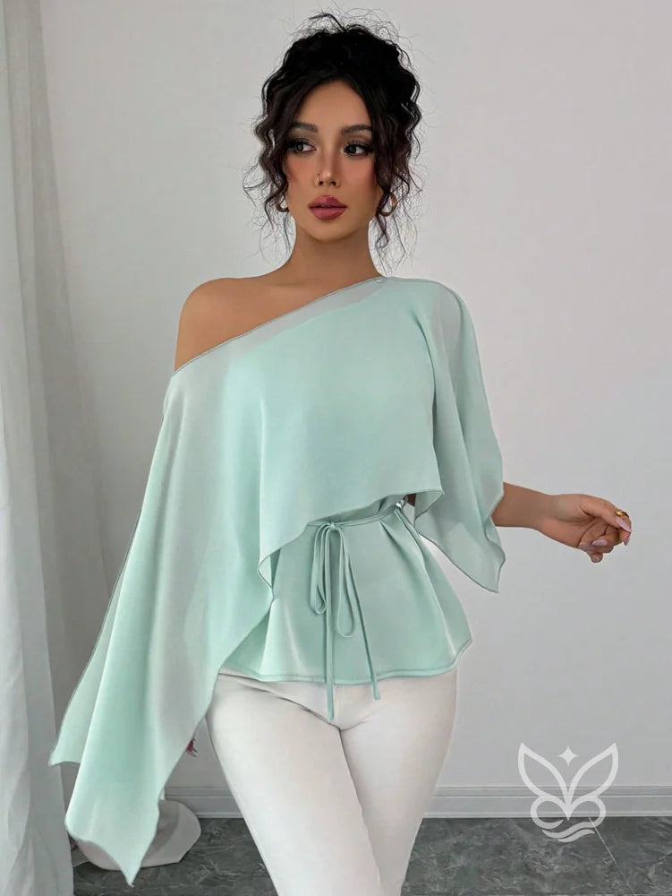 Blusa Peplum Ombro Único Com Gola Assimétrica E Cintura Marcada Blusa Peplum Ombro Único Com Gola Assimétrica E Cintura