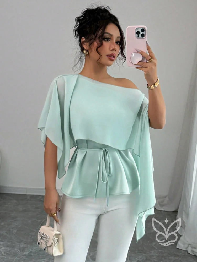 Blusa Peplum Ombro Único Com Gola Assimétrica E Cintura Marcada Blusa Peplum Ombro Único Com Gola Assimétrica E Cintura