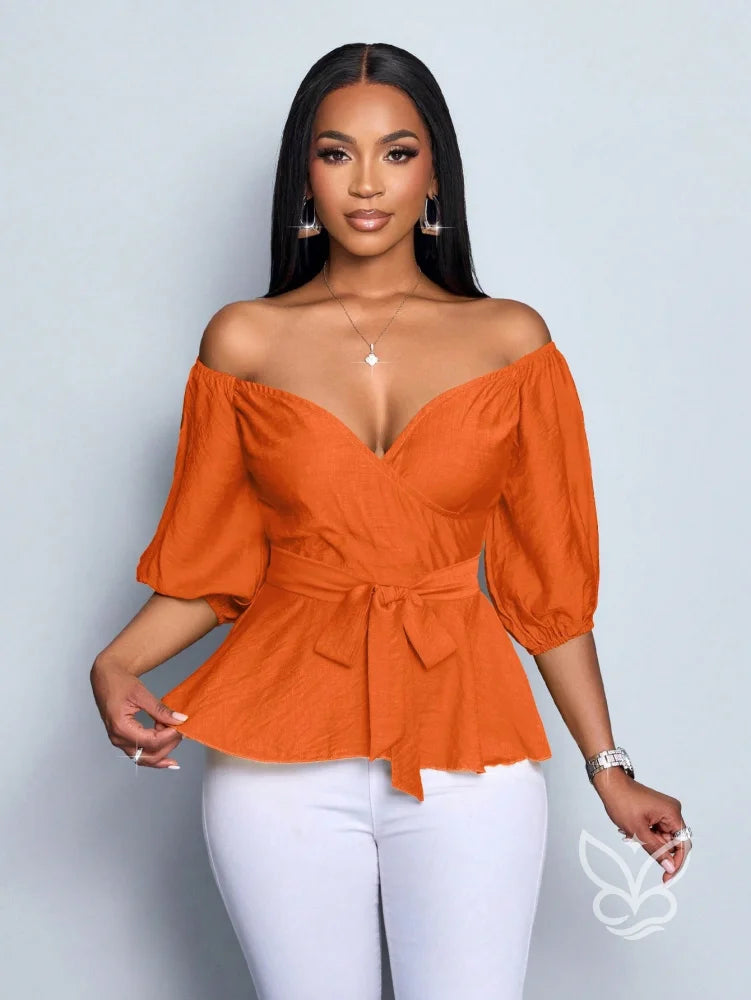 Blusa Peplum Ombro Único Manga Bufante E Amarração Na Cintura Blusa Peplum Ombro Único Manga Bufante E Amarração Na
