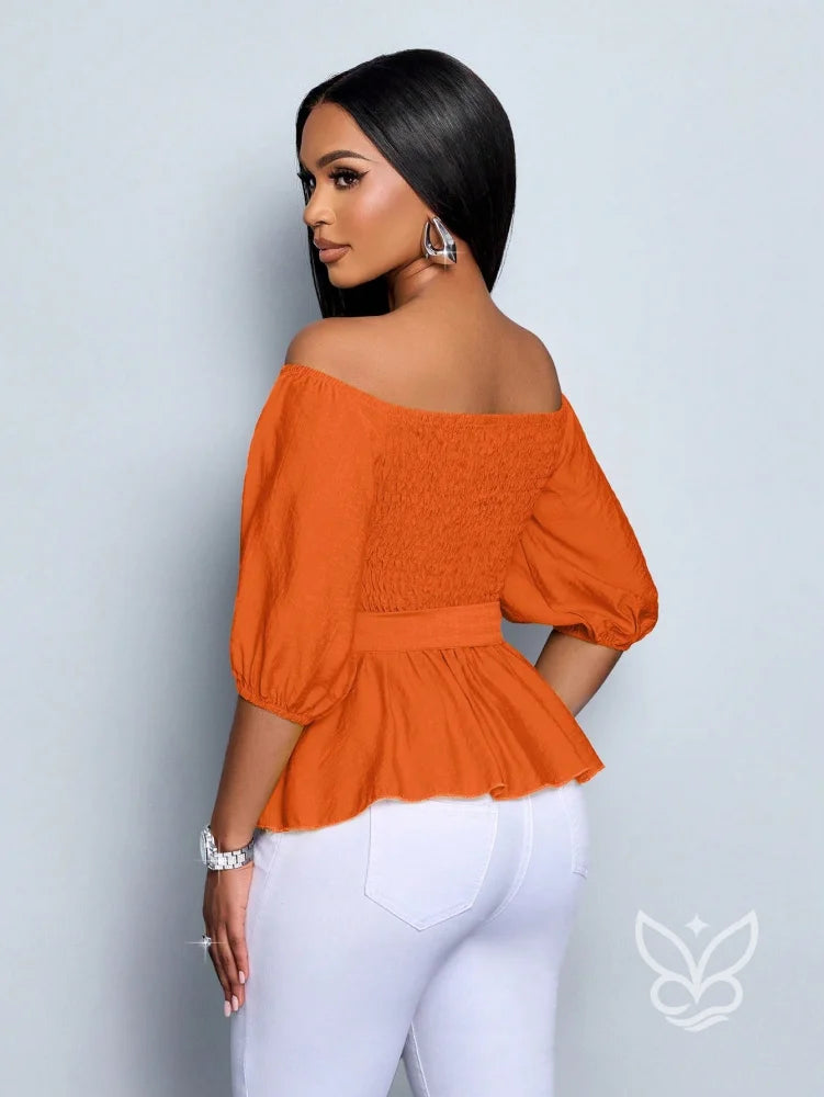 Blusa Peplum Ombro Único Manga Bufante E Amarração Na Cintura Blusa Peplum Ombro Único Manga Bufante E Amarração Na