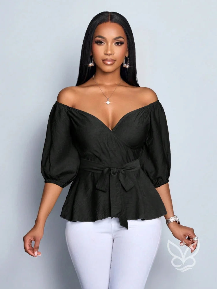 Blusa Peplum Ombro Único Manga Bufante E Amarração Na Cintura Blusa Peplum Ombro Único Manga Bufante E Amarração Na