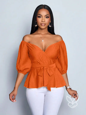 Blusa Peplum Ombro Único Manga Bufante E Amarração Na Cintura Blusa Peplum Ombro Único Manga Bufante E Amarração Na