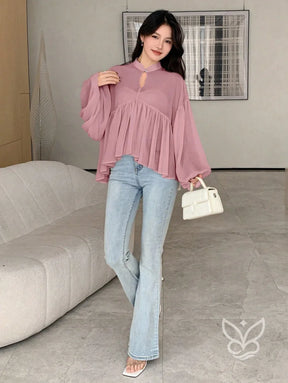 Blusa Plissada Com Gola Alta E Manga Longa Blusa Plissada Com Gola Alta E Manga Longa