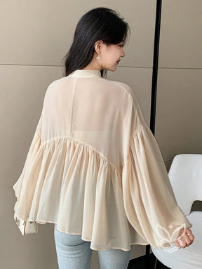 Blusa Plissada Com Gola Alta E Manga Longa Blusa Plissada Com Gola Alta E Manga Longa