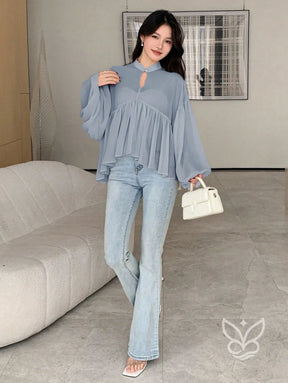 Blusa Plissada Com Gola Alta E Manga Longa Blusa Plissada Com Gola Alta E Manga Longa