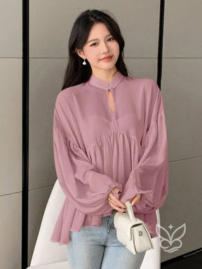 Blusa Plissada Com Gola Alta E Manga Longa Blusa Plissada Com Gola Alta E Manga Longa