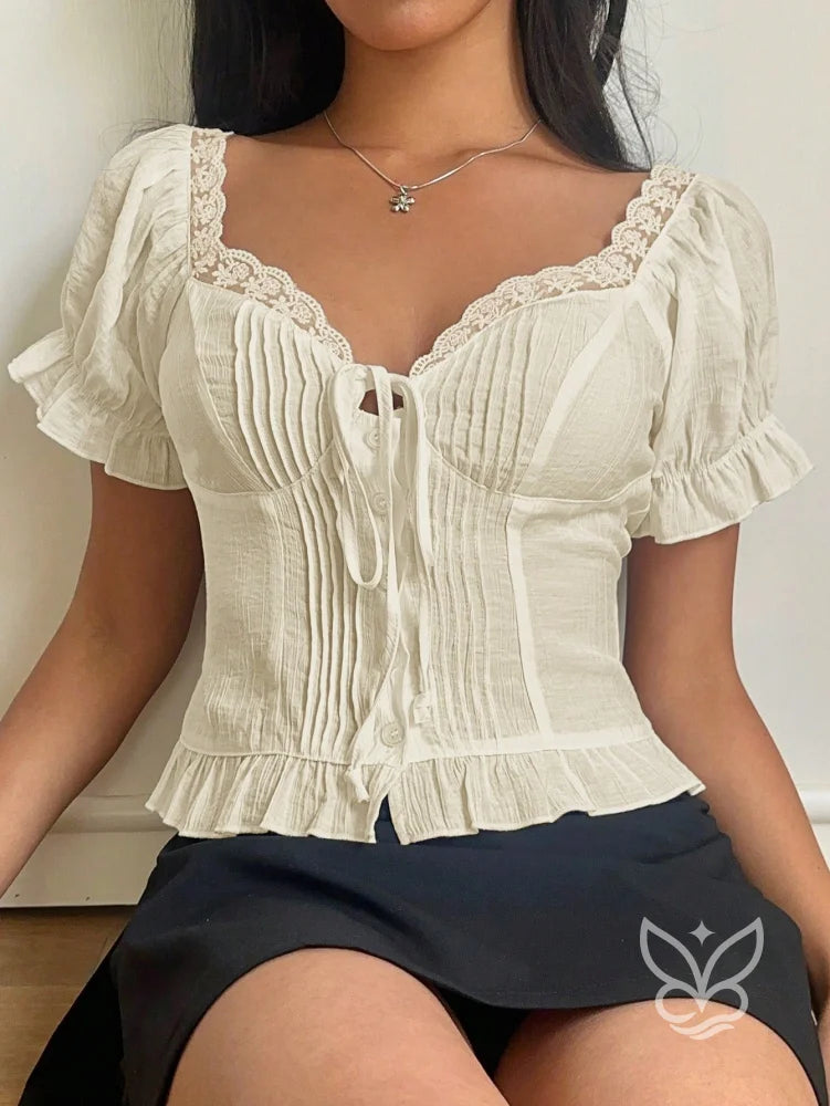 Blusa Romântica com Renda no Decote e Babados na Barra Damasco / PP Blusa Romântica com Renda no Decote e Babados na
