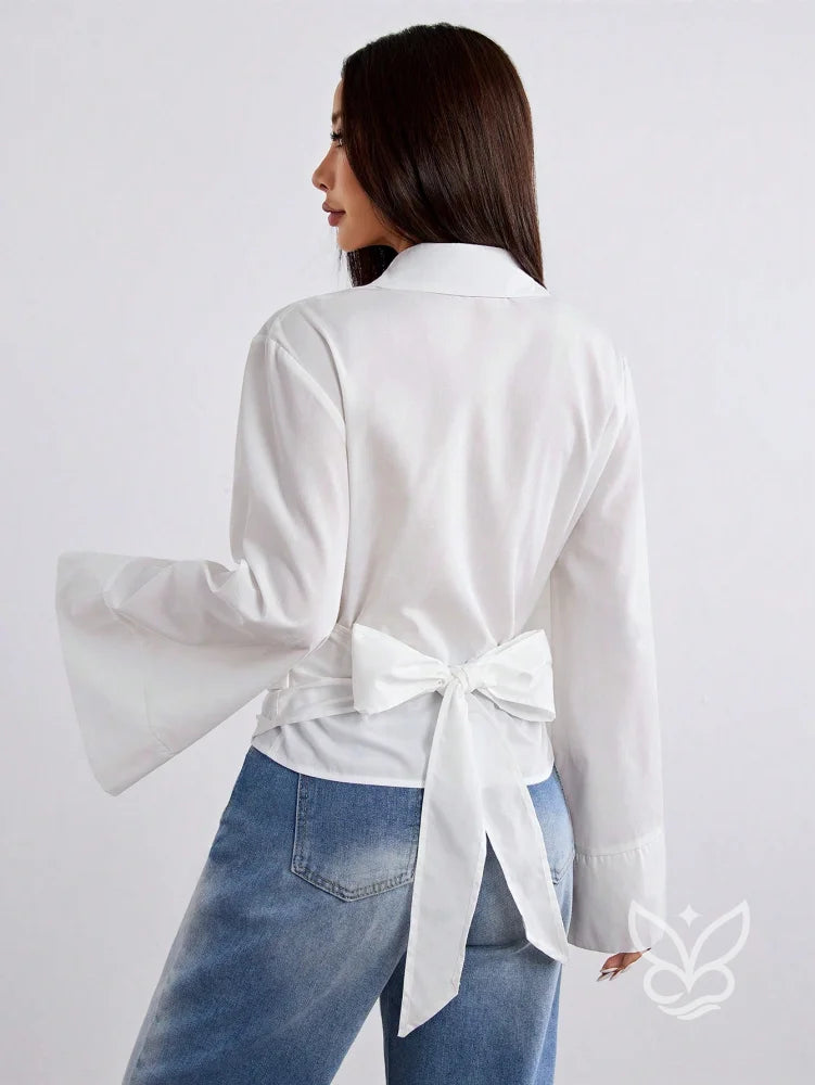 Blusa Transpassada com Manga Longa Flare Sofisticada Blusa Transpassada com Manga Longa Flare Sofisticada