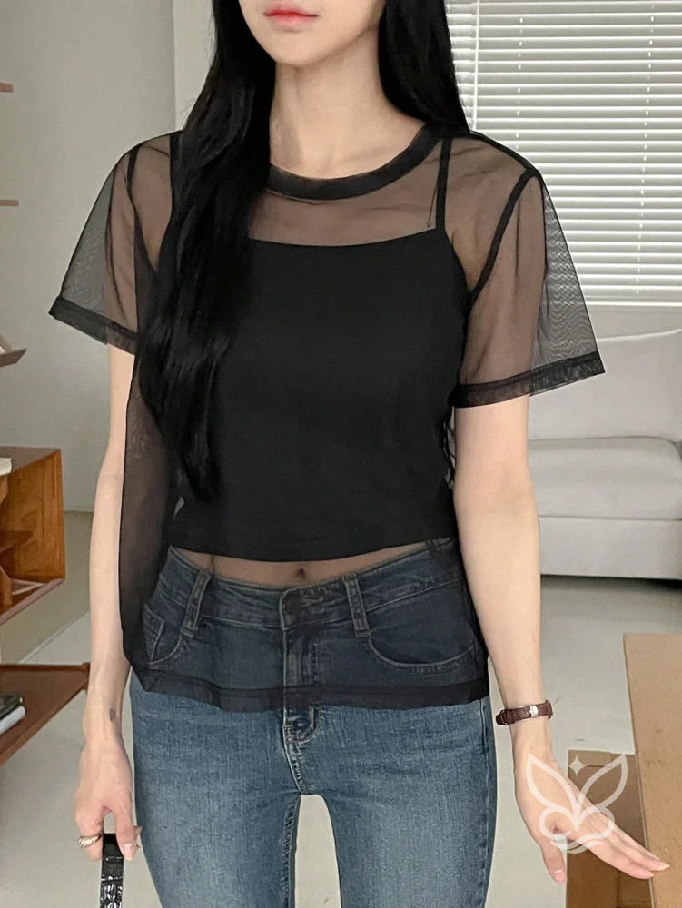 Blusa Tule Com Gola Redonda Manga Curta E Caimento Leve Blusa Tule Com Gola Redonda Manga Curta E Caimento Leve