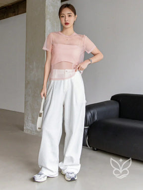 Blusa Tule Com Gola Redonda Manga Curta E Caimento Leve Blusa Tule Com Gola Redonda Manga Curta E Caimento Leve