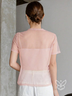 Blusa Tule Com Gola Redonda Manga Curta E Caimento Leve Blusa Tule Com Gola Redonda Manga Curta E Caimento Leve