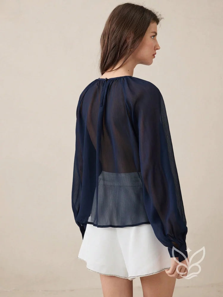 Blusa Tule Plissada Com Mangas Lanterna E Caimento Solto Blusa Tule Plissada Com Mangas Lanterna E Caimento Solto