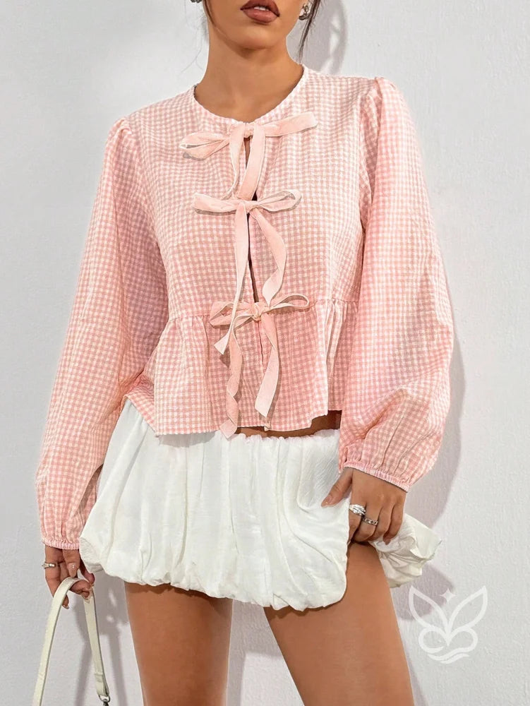 Blusa Xadrez com Laços Frontais e Barra Peplum Charmosa Blusa Xadrez com Laços Frontais e Barra Peplum Charmosa