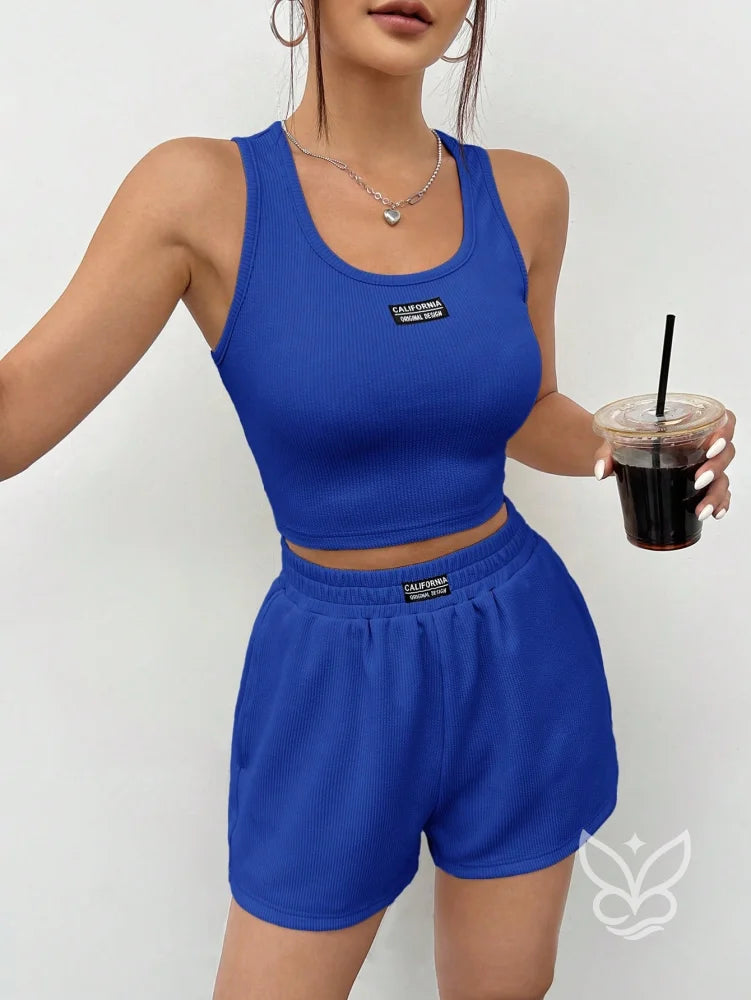 Conjunto Athleisure Com Regata Canelada E Shorts Com Cós Elástico Azul Royal / PP Conjunto Athleisure Com Regata