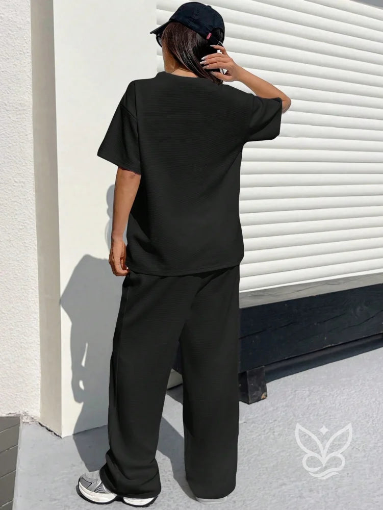 Conjunto Blusa Texturizada Solta E Calça Pantalona Conjunto Blusa Texturizada Solta E Calça Pantalona