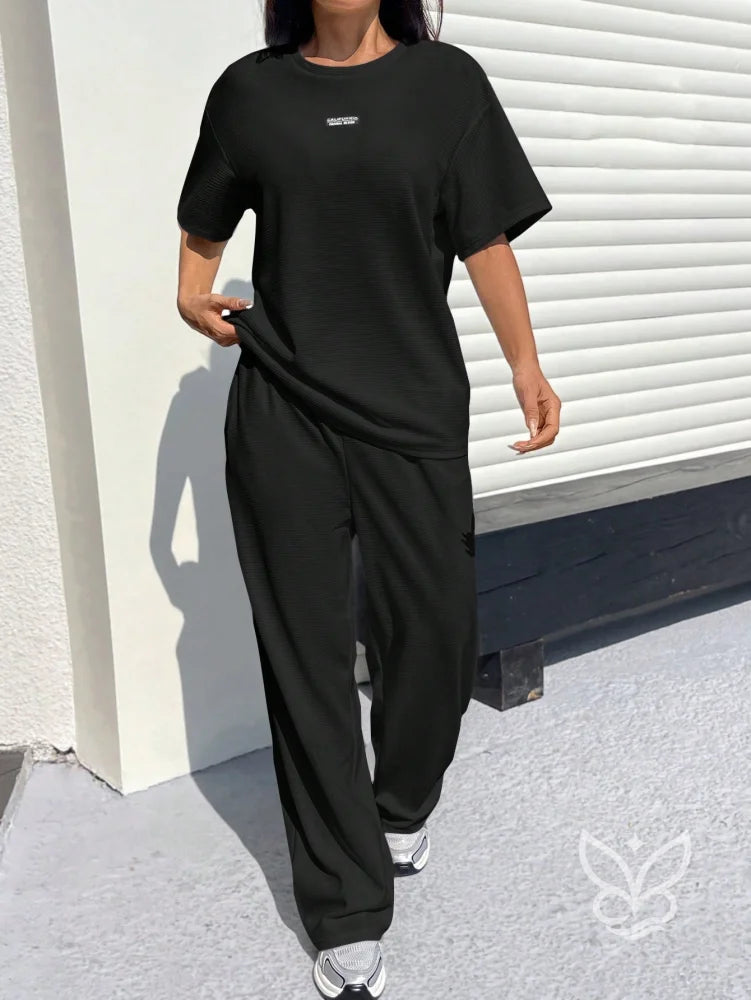 Conjunto Blusa Texturizada Solta E Calça Pantalona Preto / PP Conjunto Blusa Texturizada Solta E Calça Pantalona
