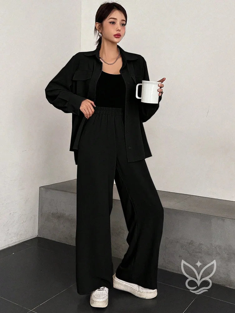 Conjunto Casual Blusa Manga Curta E Calça Flare Preto / PP Conjunto Casual Blusa Manga Curta E Calça Flare