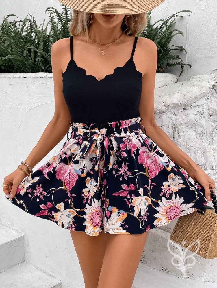 Conjunto Casual Com Regata Decote Bico E Saia Curta Estampada Conjunto Casual Regata De Alças Largas E Shorts Estampados