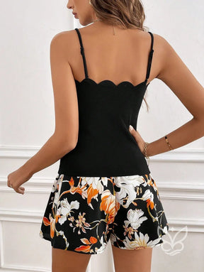 Conjunto Casual Com Regata Decote Bico E Saia Curta Estampada Conjunto Casual Regata De Alças Largas E Shorts Estampados
