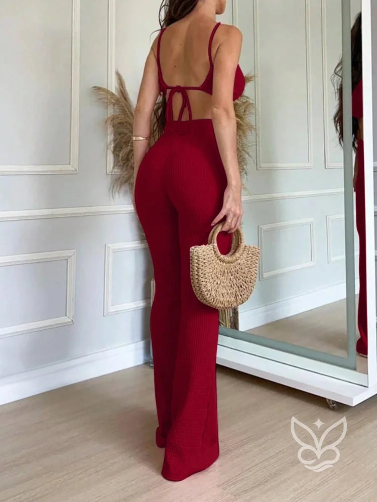 Conjunto Cropped Halter Com Amarração Nas Costas E Calça Flare Conjunto Cropped Halter Com Amarração Nas Costas E Calça