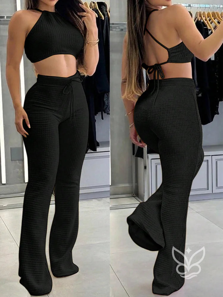 Conjunto Cropped Halter Com Amarração Nas Costas E Calça Flare Preto / PP Conjunto Cropped Halter Com Amarração Nas