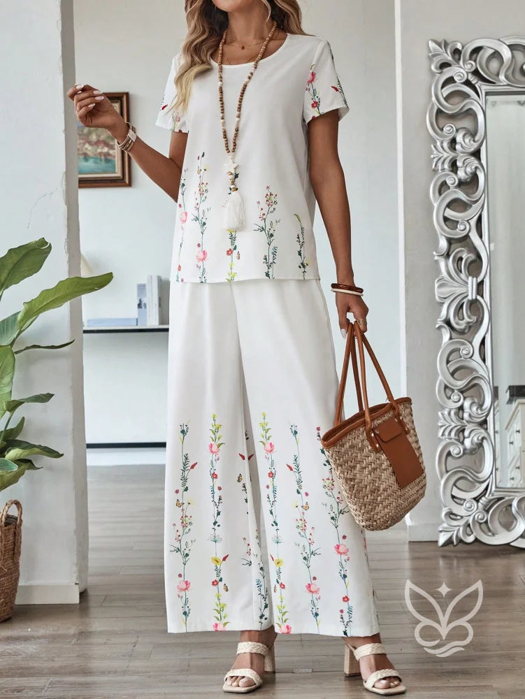 Conjunto Floral Com Blusa De Manga Curta E Calça Pantalona Branco / PP Conjunto Floral Com Blusa De Manga Curta E Calça