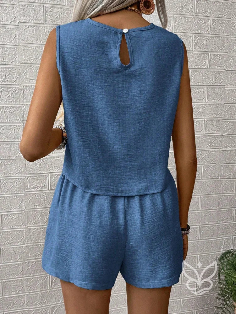 Conjunto Linho Com Bordado Floral E Shorts De Cintura Alta Conjunto Linho Com Bordado Floral E Shorts De Cintura Alta