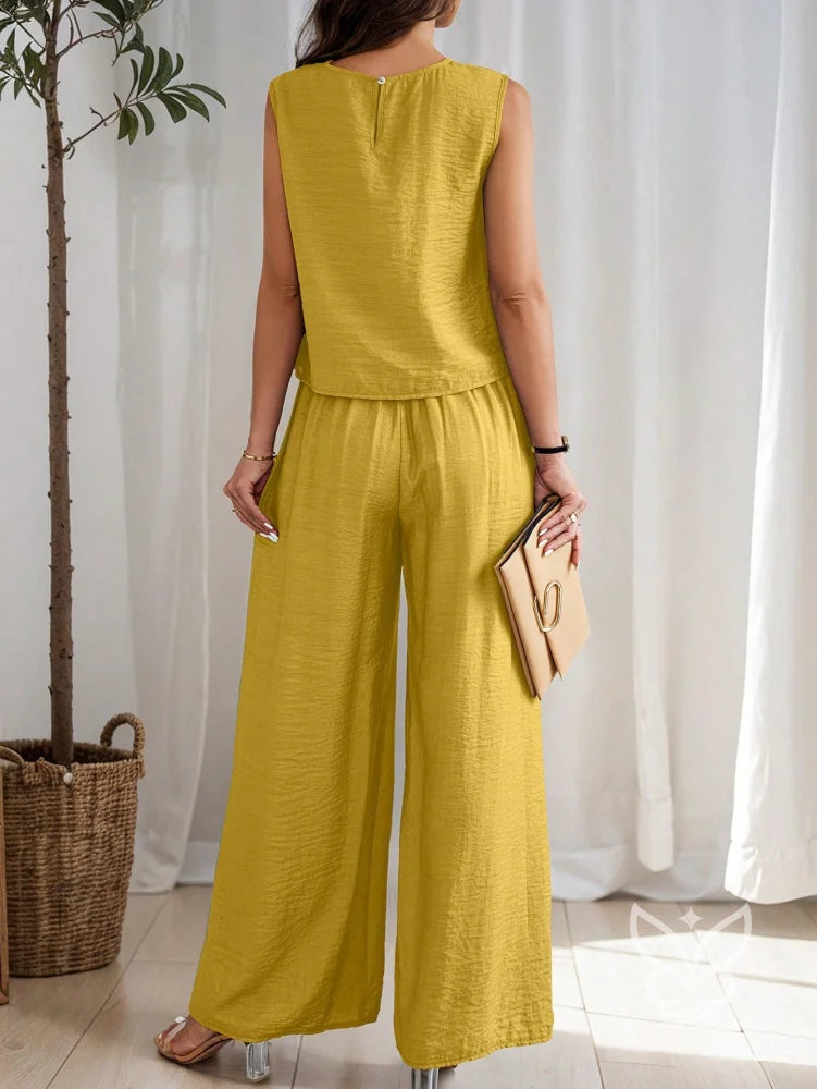Conjunto Minimalista Com Blusa Reta E Calça Pantalona Fluida Conjunto Minimalista Com Blusa Reta E Calça Pantalona