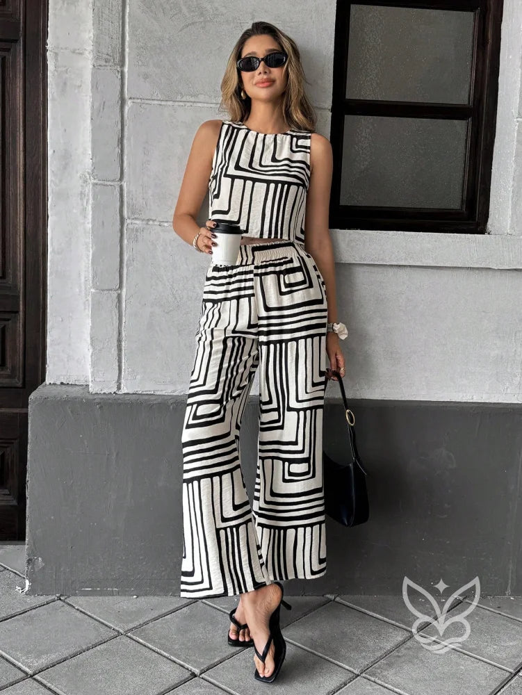 Conjunto Regata Estampada Com Calça Pantalona Estampada Preto e Branco / PP Conjunto Regata Estampada Com Calça