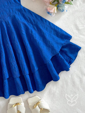 Vestido Bandeau Mini com Franzido no Busto e Barra Assimétrica Vestido Bandeau Mini com Franzido no Busto e Barra