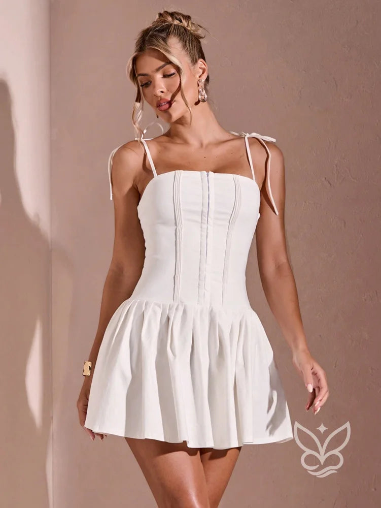 Vestido Curto Alças Finas Cintura Baixa Plissado E Barra Bufante Vestido Curto Alças Finas Cintura Baixa Plissado E