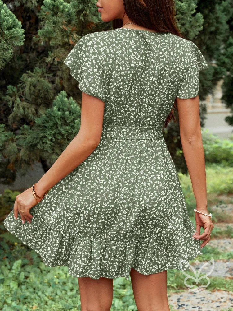 Vestido Curto Com Estampa Floral E Laço Na Cintura Vestido Curto Estampado Com Gola Alta E Recorte Lateral
