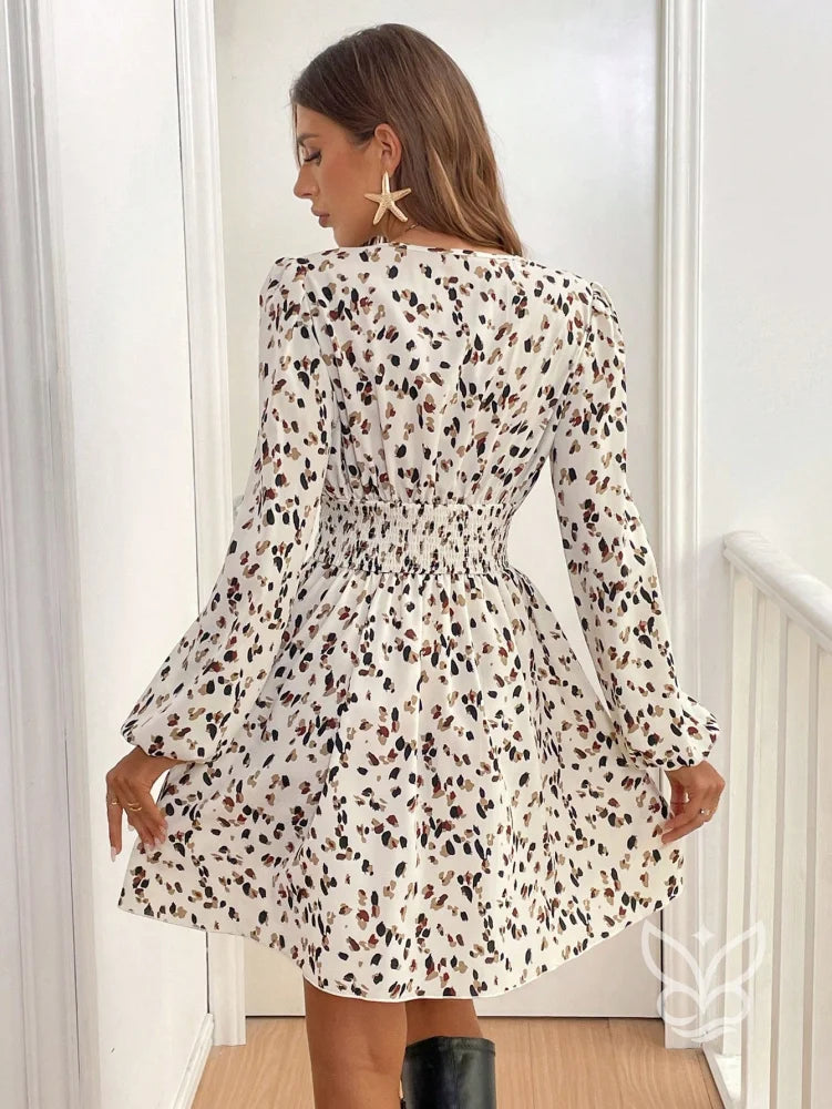 Vestido Curto Floral Com Manga Longa E Decote V Vestido Curto Floral Com Manga Longa E Decote V
