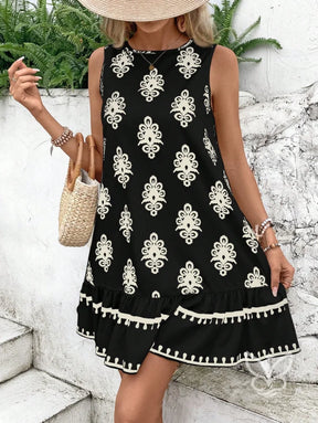 Vestido Curto Soltinho Com Estampa E Laço Nas Costas Vestido Curto Soltinho Com Estampa E Laço Nas Costas