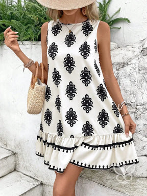 Vestido Curto Soltinho Com Estampa E Laço Nas Costas Vestido Curto Soltinho Com Estampa E Laço Nas Costas