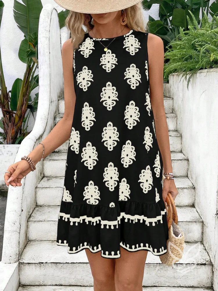 Vestido Curto Soltinho Com Estampa E Laço Nas Costas Vestido Curto Soltinho Com Estampa E Laço Nas Costas