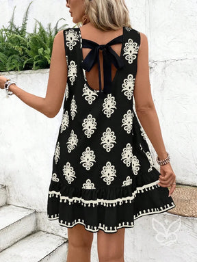 Vestido Curto Soltinho Com Estampa E Laço Nas Costas Preto / PP Vestido Curto Soltinho Com Estampa E Laço Nas Costas
