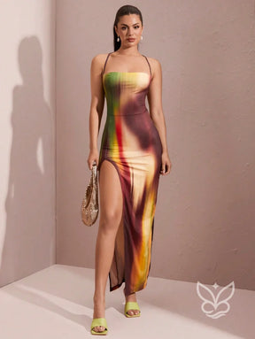 Vestido Longo Estampado Com Fenda E Amarração Nas Costas Vestido Longo Estampado Com Fenda E Amarração Nas Costas