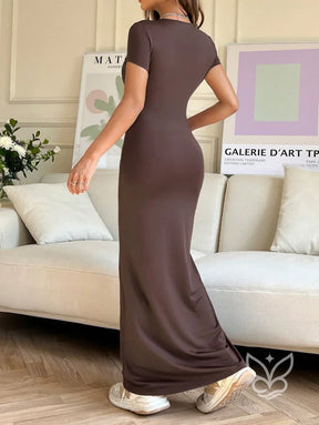 Vestido Longo Justo Com Cintura Marcada E Manga Curta Vestido Longo Justo Com Cintura Marcada E Manga Curta