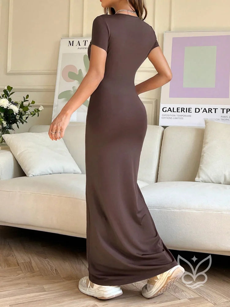 Vestido Longo Justo Com Cintura Marcada E Manga Curta Vestido Longo Justo Com Cintura Marcada E Manga Curta