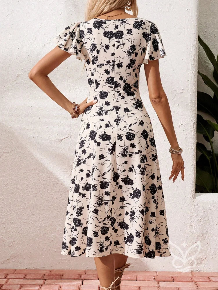 Vestido Midi Floral Com Botões E Fenda Frontal Vestido Midi Floral Com Botões E Fenda Frontal