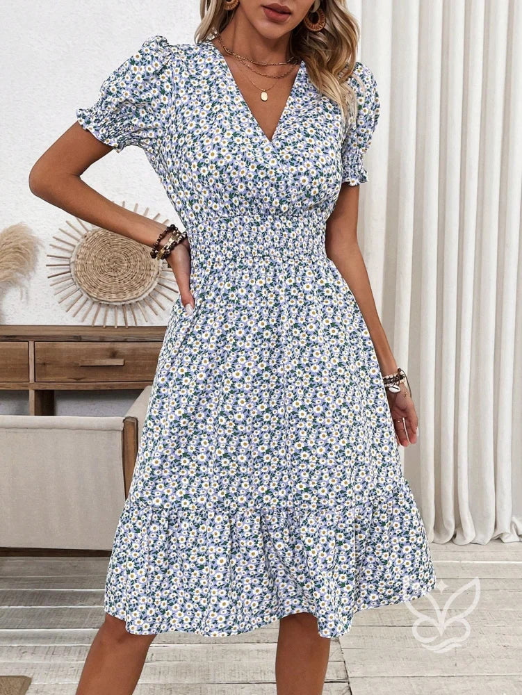 Vestido Midi Floral Com Manga Curta Bufante E Decote V Vestido Midi Floral Com Manga Curta Bufante E Decote V