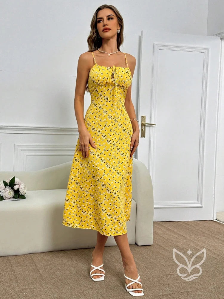 Vestido Midi Justo Floral Com Alça Fina E Barra Assimétrica Vestido Midi Justo Floral Com Alça Fina E Barra Assimétrica