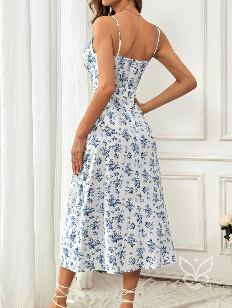 Vestido Midi Justo Floral Com Alça Fina E Barra Assimétrica Vestido Midi Justo Floral Com Alça Fina E Barra Assimétrica
