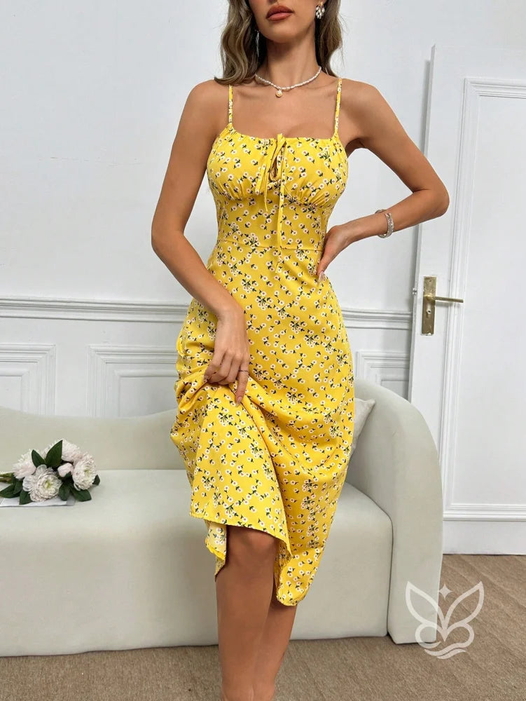 Vestido Midi Justo Floral Com Alça Fina E Barra Assimétrica Vestido Midi Justo Floral Com Alça Fina E Barra Assimétrica