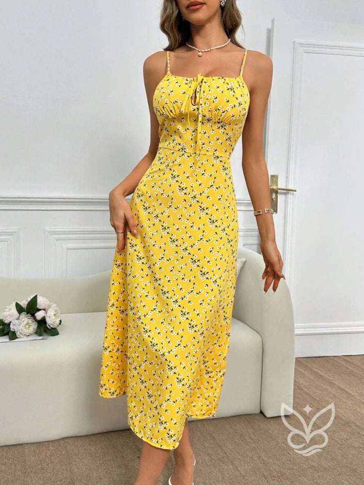 Vestido Midi Justo Floral Com Alça Fina E Barra Assimétrica Amarela / PP Vestido Midi Justo Floral Com Alça Fina E