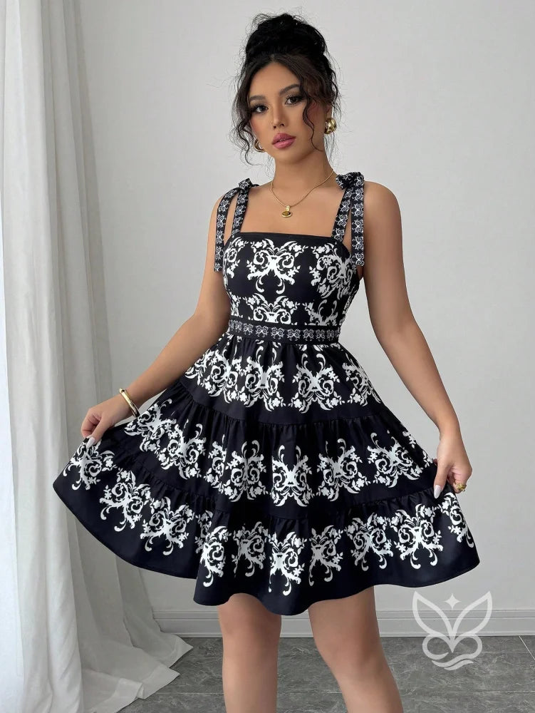 Vestido Rodado Com Alça Laço E Bordado Floral Contrastante Vestido Rodado Com Alça Laço E Bordado Floral Contrastante
