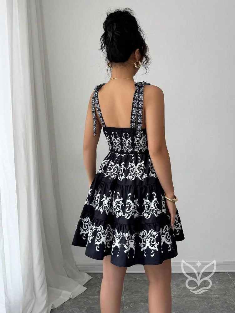 Vestido Rodado Com Alça Laço E Bordado Floral Contrastante Vestido Rodado Com Alça Laço E Bordado Floral Contrastante